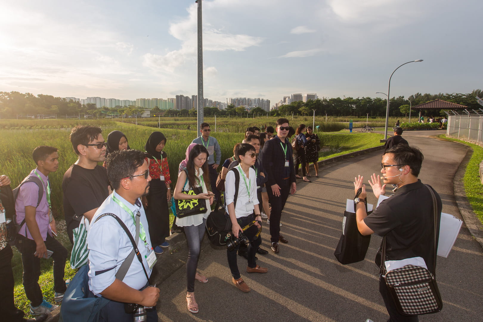 Participants taking in information about Singapore’s innovative approach to transforming a former landfill site into a park at Lorong Halus Wetlands